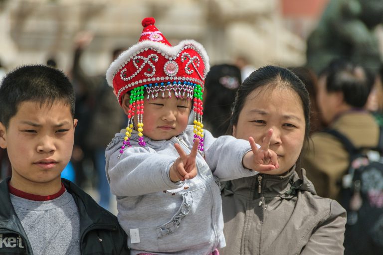 Beijing, China - April 27, 2010: Closeup Of Little Kid On Arms O